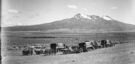 Date: ca 1940
Ref: 1/2-047772-G
Groups of soldiers lined up beside gun carriages and covered trucks. Mount Ruapehu can be seen in the distance across the plateau. Photographed by Sydney Charles Smith in about 1940
Waiouru Military Camp opened 1938/1939 Soldiers lined up on what will become Waiouru Military Camp - Waiouru 1940